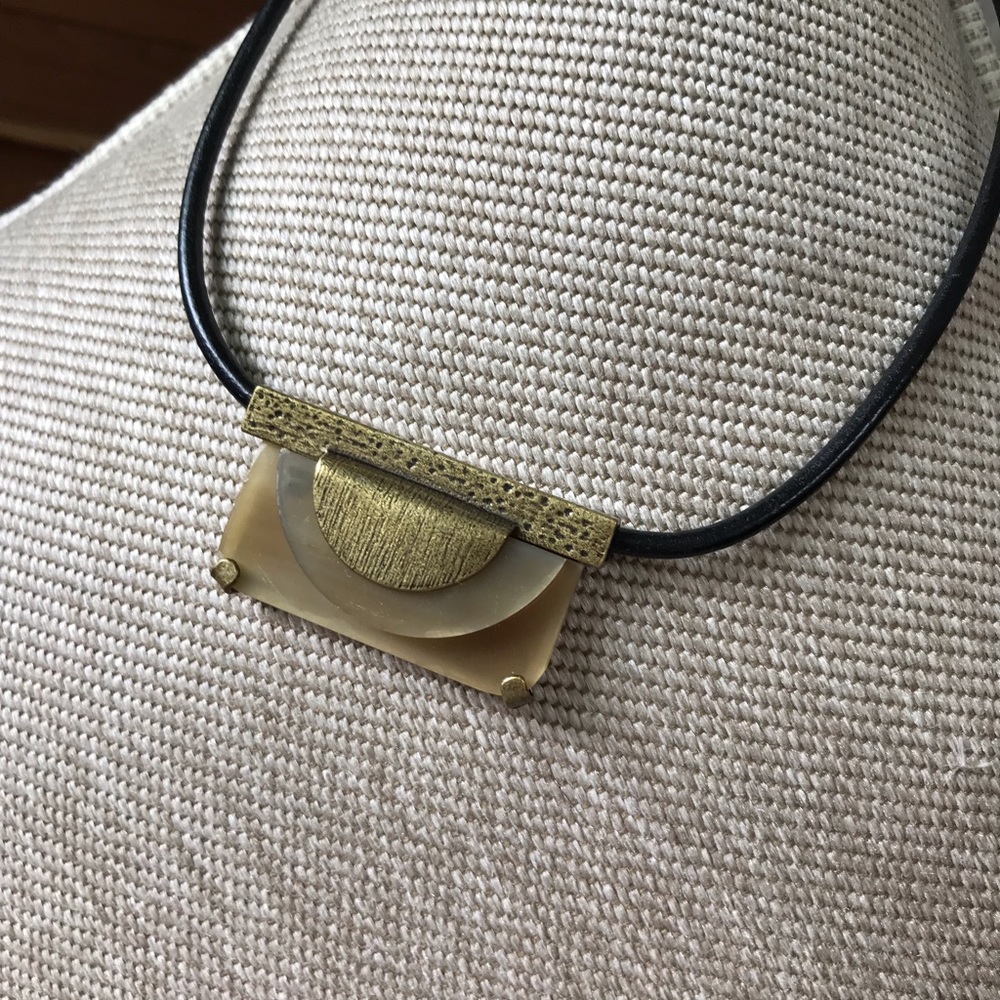 Silpada by R and K leather and brass necklace with some glass in EUC.